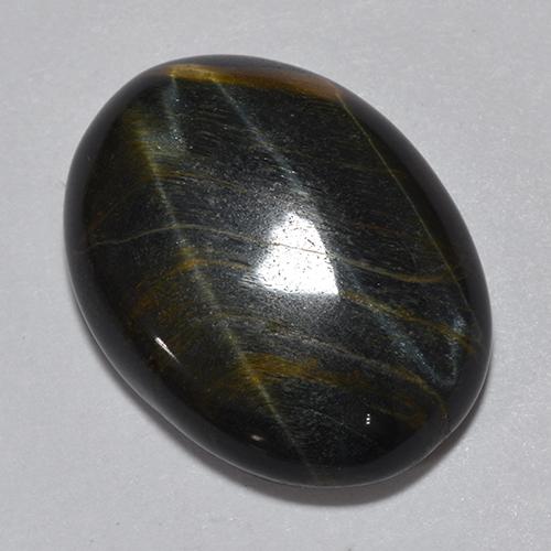 Натуральный многоцветный tiger's eye 11,75 карата огранка овал, непрозрачный