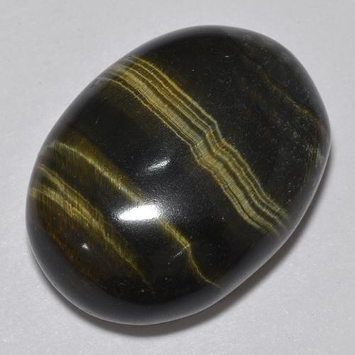 Натуральный многоцветный tiger's eye 19,06 карата огранка овал, непрозрачный