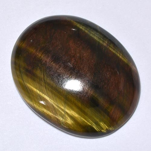 Натуральный многоцветный tiger's eye 24,66 карата огранка овал, непрозрачный
