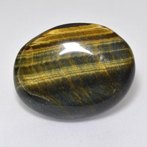 Натуральный многоцветный tiger's eye 12,92 карата огранка овал, непрозрачный