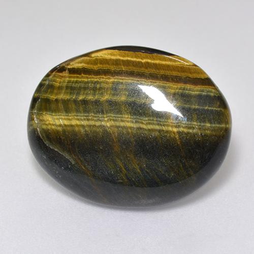 Натуральный многоцветный tiger's eye 12,92 карата огранка овал, непрозрачный