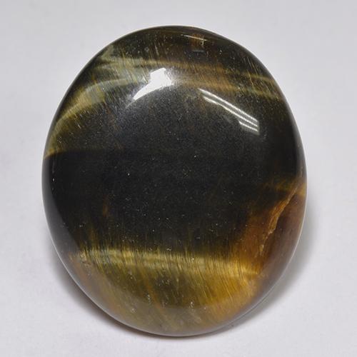 Натуральный многоцветный tiger's eye 14,43 карата огранка овал, непрозрачный