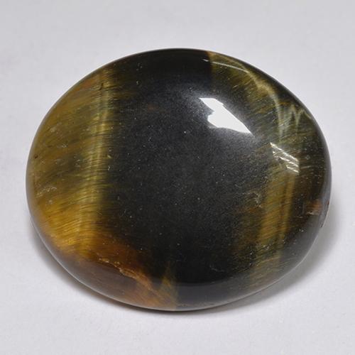 Натуральный многоцветный tiger's eye 14,43 карата огранка овал, непрозрачный