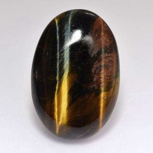 Натуральный многоцветный tiger's eye 18,46 карата огранка овал, непрозрачный
