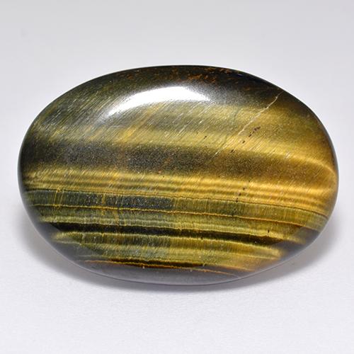 Натуральный коричневый tiger's eye 23,65 карата огранка овал, непрозрачный