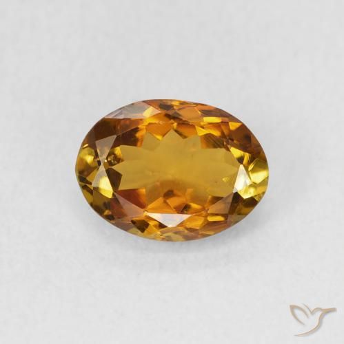 1.27ct Натуральный Golden Orange to Deep Brown Турмалин, Овал, Чистота VS