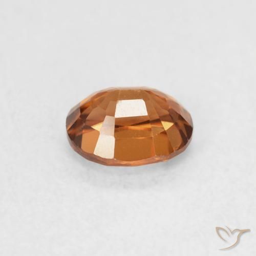 0.67 карата, натуральный Medium Dark-Orange Циркон, Овал, Чистота VVS