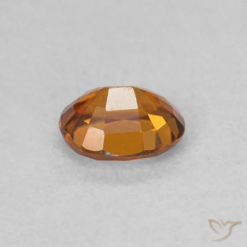 0.62 карата, натуральный Medium Dark-Orange Циркон, Овал, Чистота VVS