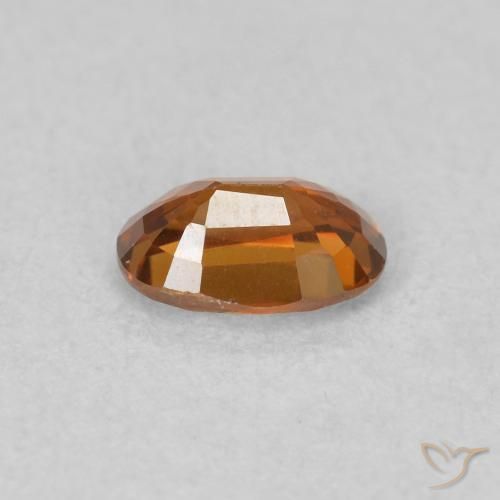 0.73 карата, натуральный Medium Dark-Orange Циркон, Овал, Чистота VVS