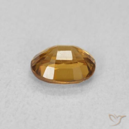 0.60 карата, натуральный Оранжево-коричневый Циркон, Овал, Чистота VVS